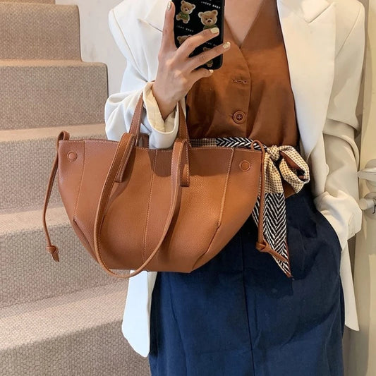 The Everyday Muse Tote Bag, Genuine Leather Drawstring Silhouette for Work and Travel - Tessbury - situation