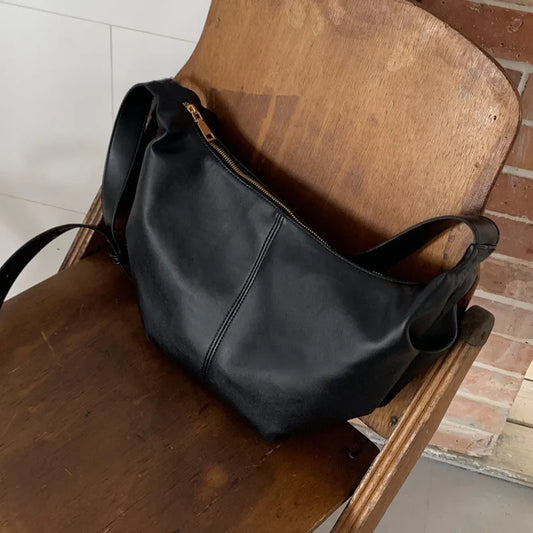 The Dumpling Crossbody Bags - Everyday Allure in Leather - Tessbury - situation
