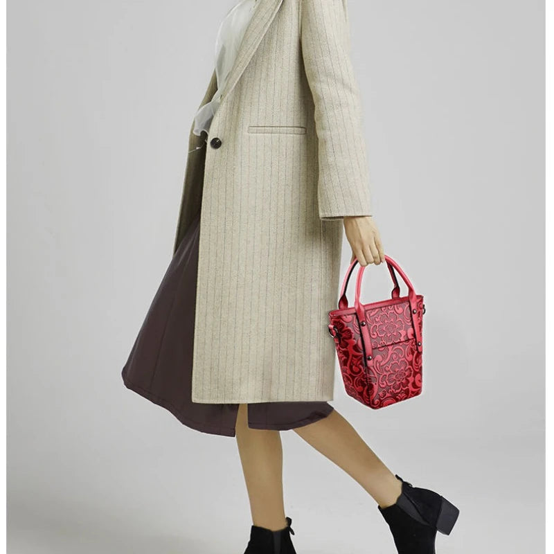 The Carved Legacy Crossbody Bag - Embossed Genuine Leather Everyday Bag - Tessbury - situation