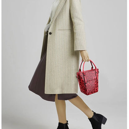 The Carved Legacy Crossbody Bag - Embossed Genuine Leather Everyday Bag - Tessbury - situation